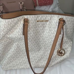 A large micheal khors purse